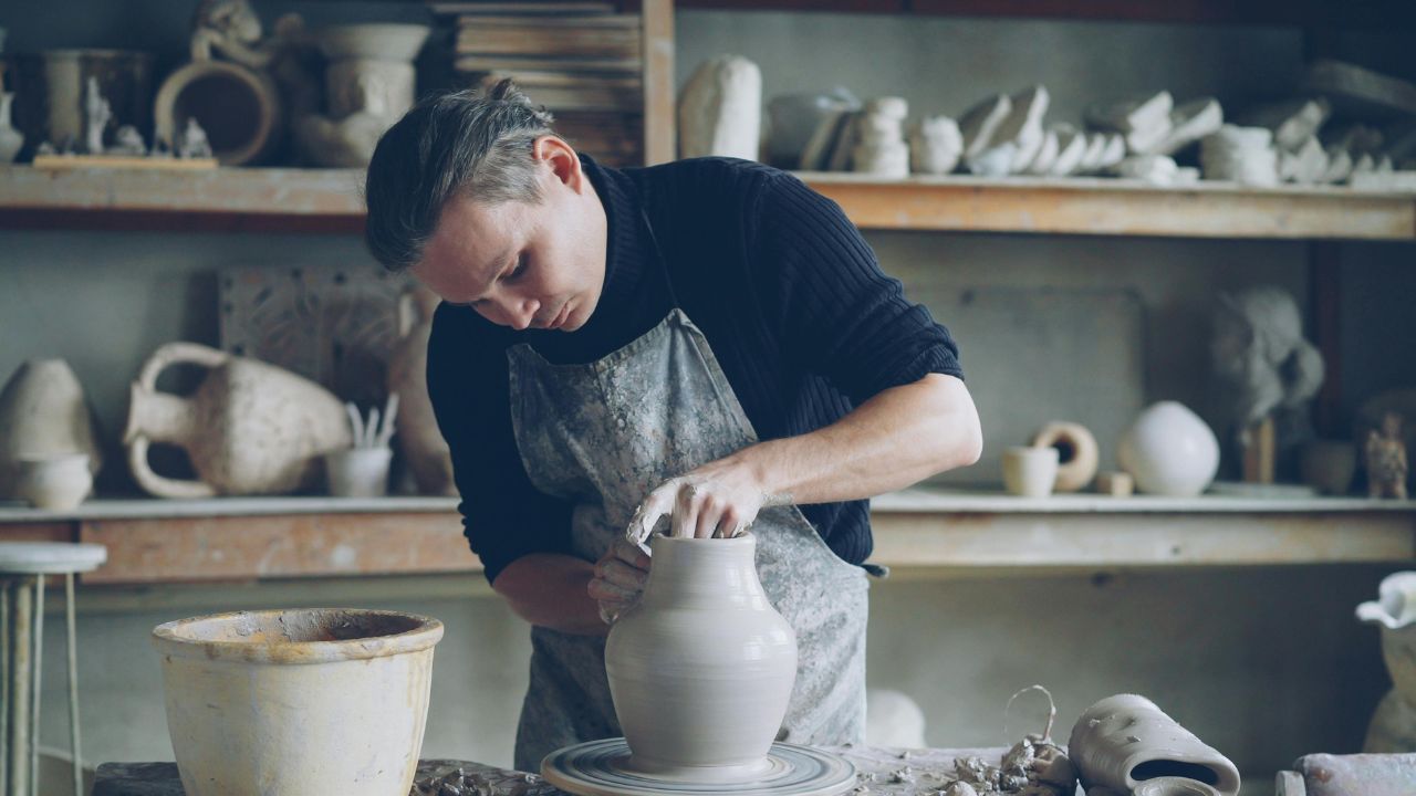 Skillful Entrepreneur Working at His Small Business